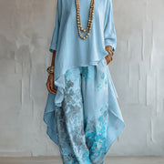 Ensemble haut asymétrique bleu et pantalon large à fleurs