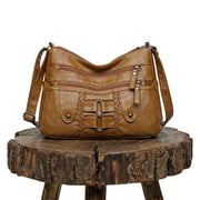 Monica | Sac Porté Travers Tressé à Multiples Zips
