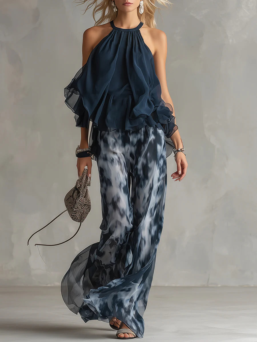 Ensemble haut halter bleu marine et pantalon large imprimé en mousseline