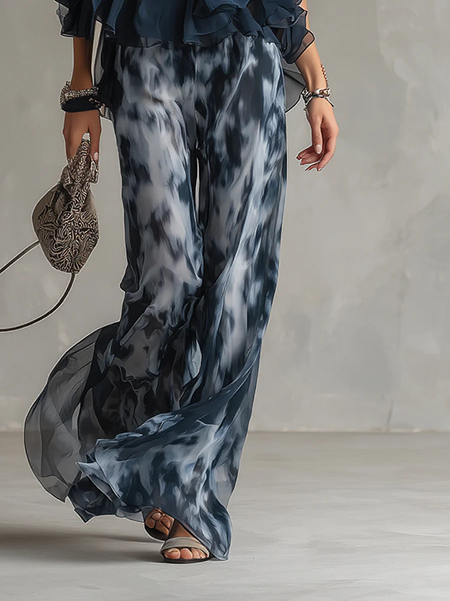 Ensemble haut halter bleu marine et pantalon large imprimé en mousseline
